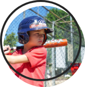 Child preparing to swing a baseball bat
