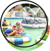 People driving bumper boats.