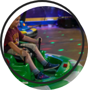 Child riding the bumper cars.